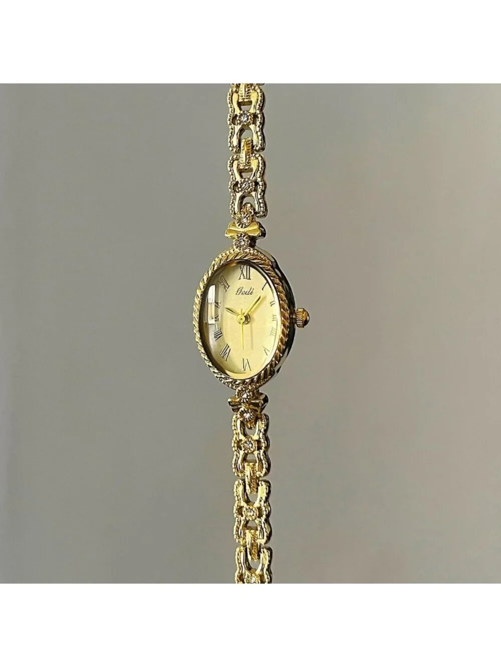 Women's Gold Analog Quartz Alloy Steel Oval Roman Numeral Number Bracelet Watch